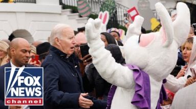 Biden whisked away by 'Easter bunny' while taking reporter questions